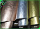 Ο κάτοχος δοχείων εγκαταστάσεων τοποθετεί τα μεταλλικά Shinny σε σάκκο υλικά εγγράφου της Kraft χρώματος Washable