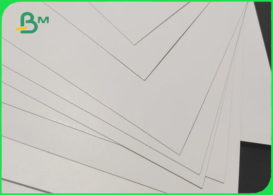 Το έξοχο μαζικό άσπρο χαρτόνι εμπορευματοκιβωτίων τροφίμων έντυσε ένα δευτερεύον 215gsm